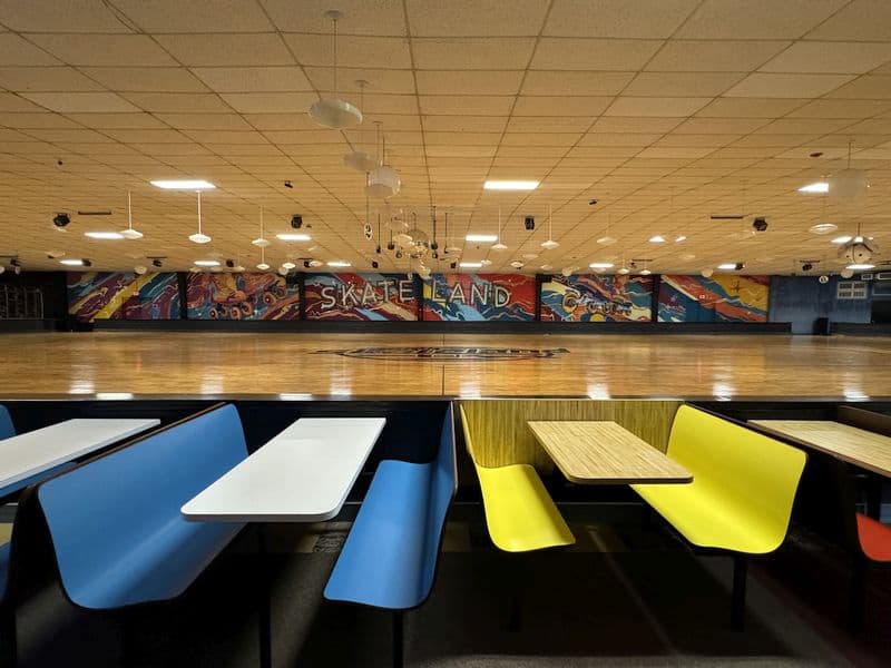 Skateland rink with tables surrounding